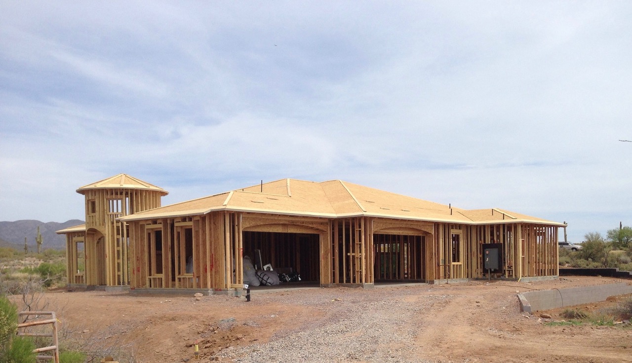 is it better to buy a lot and build a house