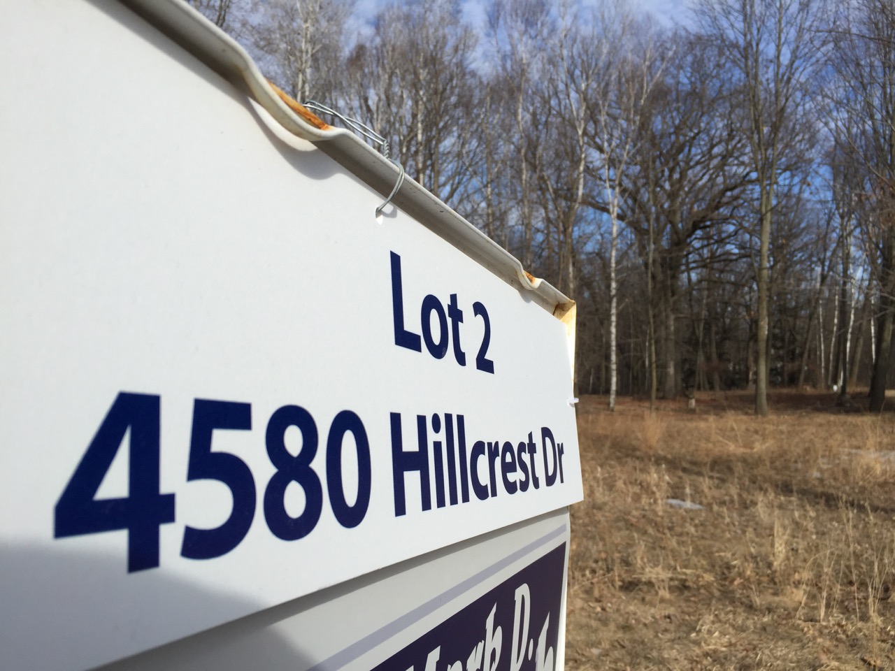 is it better to buy a lot and build a house